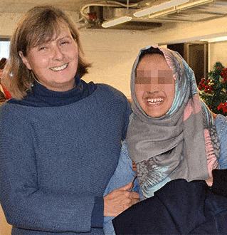 Good-bye to Raida*, with a wide smile!