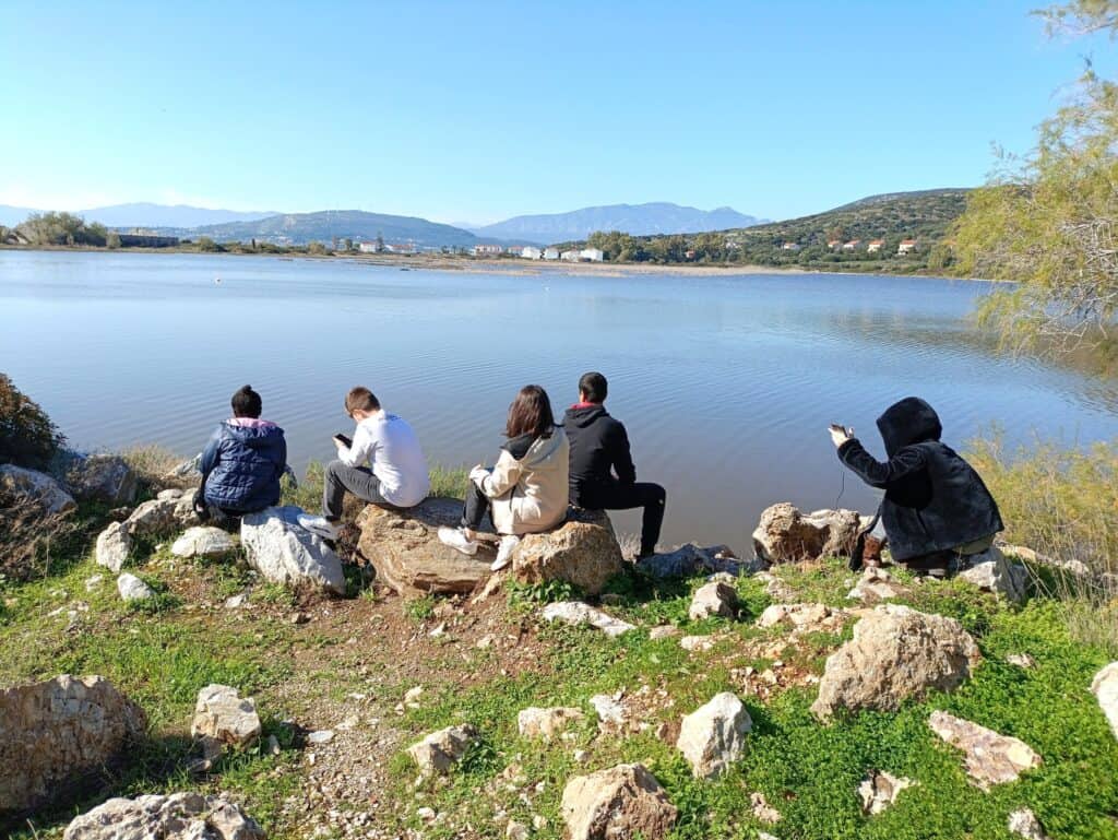Metadrasi - Unaccompanied children of our accommodation facility in Samos admire the flamingos 1 Metadrasi - METAdrasi Samos shelter 1