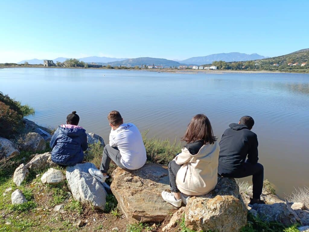 Metadrasi - Unaccompanied children of our accommodation facility in Samos admire the flamingos 2 Metadrasi - METAdrasi Samos shelter 4